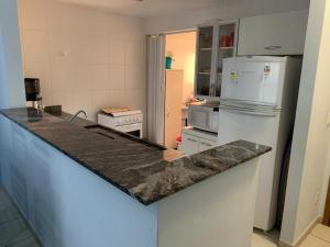 Apartamento de Temporada `A ilha Praia Home Resort`