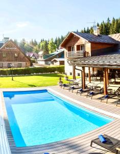 Chalet Schäfer s vyhřívaným bazénem se slanou vodou a saunou