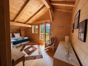 Chalet de Luxe avec Piscine Intérieure et Sauna - Vue Montagne Manigod