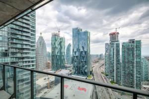 Downtown 2BR condo with city views and free parking