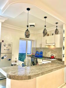Modern Pool View Apartment Near Beach & Airport