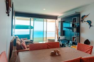 Departamento con vista al mar, piscina, jacuzzi y área BBQ
