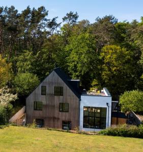 Design-Wohnung am Waldrand mit Dachterrasse und Blick auf das Achterwasser