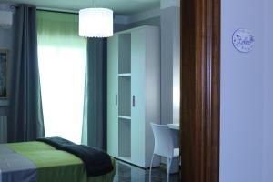 Camera Quadrupla con Bagno in Comune
