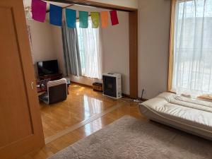 インディゴハウスIndigo House For women and families only, 5-minute walk from the Omagari station,