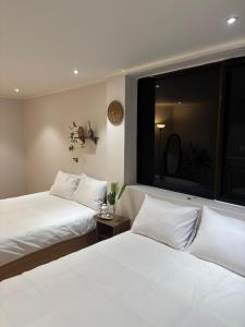 Near Busan Station, 6people, Room2 Bed3, 12pm, luggage, OTT, washing machine