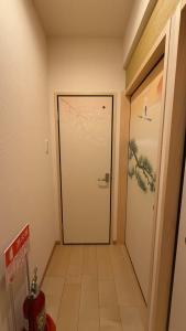 Luxury Japanese Style Single Family Home Accommodates 7 Private Courtyard 7 Minutes to Tengachaya Station 2 Stops 3 Minutes to Namba and Shinsaibashi 3 Bedrooms 1 Living Room 2 Bathrooms