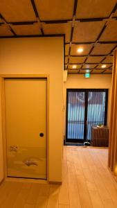 Luxury Japanese Style Single Family Home Accommodates 7 Private Courtyard 7 Minutes to Tengachaya Station 2 Stops 3 Minutes to Namba and Shinsaibashi 3 Bedrooms 1 Living Room 2 Bathrooms