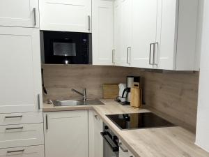 Fehmarn Burgtiefe Südstrand 2 Zimmer Wohnung SEESTERN mit Süd-Bk WaMa