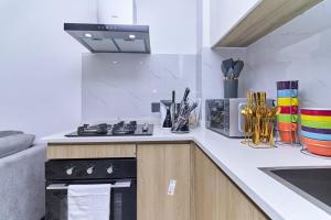 Comfort 1BR Lavington Behind Junction Mall - Fast WiFi, Pool & Gym