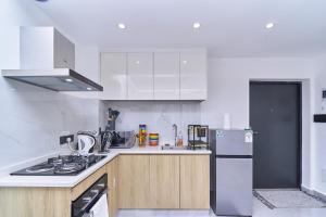 Comfort 1BR Lavington Behind Junction Mall - Fast WiFi, Pool & Gym