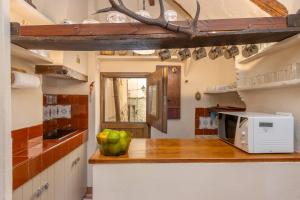 Casa medieval reformada en uno de los pueblos más bonitos de Girona, con aire acondicionado y Wi-fi