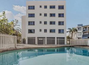 Coastal Comfort with Ocean Views from Shared Rooftop and Separate Pool