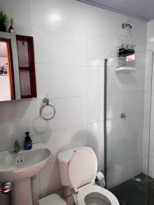 Habitación confortable y terraza Hamacas Coveñas