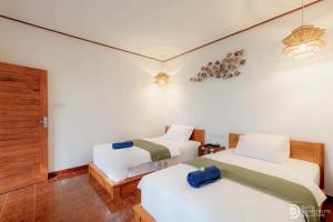 Paradise Palm Beach Bungalows and Dive Center