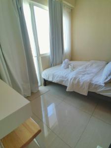 The Pent Suites - Elegant Ivory at Top Suites