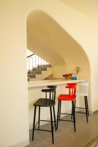 SaffronStays Ivory and Orange