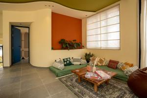 SaffronStays Ivory and Orange