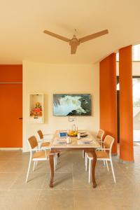 SaffronStays Ivory and Orange
