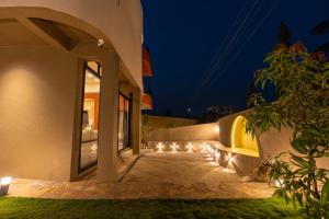 SaffronStays Ivory and Orange