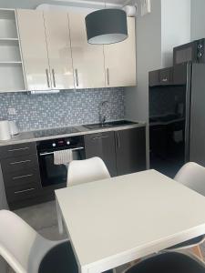 Apartament Strefa Czasu z wewnętrznym ogrodzonym parkingiem