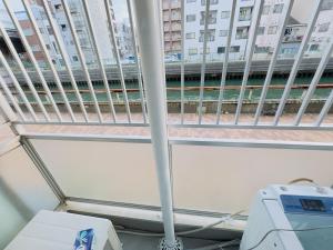 101 Dotonbori Riverside 5 min walk to Dotonbori Kuromon Market Shinsaibashi, Namba Business District Balcony with washing machine 1F free dryer, microwave