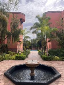 résidence patio et jardin avec piscine 2chambres