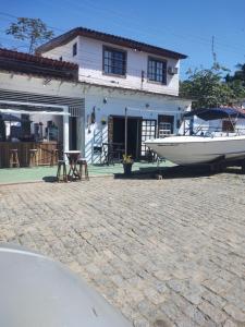 Pousada Dádiva 4 Quarto compartilhado Feminino Econômico e Simples Praia do Pontal Centro
