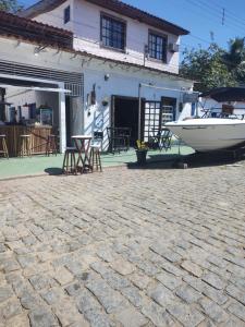 Pousada Dádiva 4 Quarto compartilhado Feminino Econômico e Simples Praia do Pontal Centro