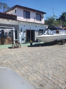 Pousada Dádiva 4 Quarto compartilhado Feminino Econômico e Simples Praia do Pontal Centro