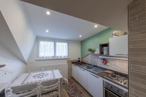 House Cuel Milena Folgaria - Green