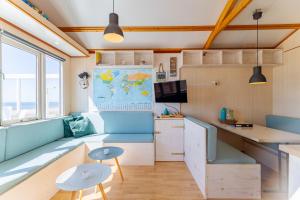 Welcome in - Slaapstrandhuisje I Strand dishoek 342, Direct aan zee met panoramisch uitzicht