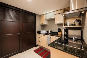 CR MARIPOSA RENTALS Comfortable penthouse, AC, pool, gym, tennis