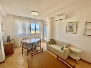 Modern beachfront stay with parking