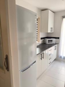 Apartamento reformado con gran terraza privada, parking y aire acondicionado en Torrequebrad