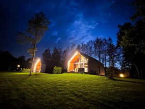Sniegi design cabin with included sauna and jacuzzi