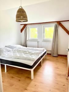 2 Schlafzimmer mit Sauna, Gartenblick & Grill - das Draussen
