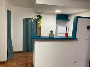 OCCHI BLU House