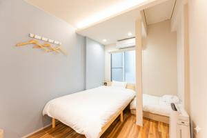 Direct access to the airport , Private accommodation in Osaka city , 3-minute walk from the station , Maximum 7 people , No transfers required to Namba, Umeda, and Tennoji , Government-certified accommodation