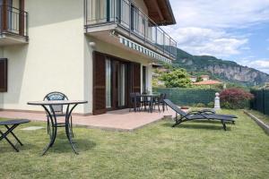 Appartamento Vista Lago con Giardino e Piscina