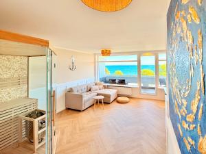FeWo Traumblick - Wellnesswelle - Sauna, Design & erste Reihe mit Panorama Meerblick