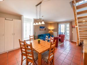 Feriendorf Rugana - Komfortplus Ferienwohnung mit 2 Schlafzimmern und Terrasse A64