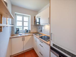 Feriendorf Rugana - Komfortplus Ferienwohnung mit 2 Schlafzimmern und Terrasse A64
