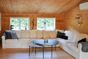 Log House Close To The Sea And Coastal Towns