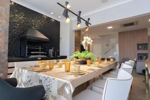 Casas Paradiso - Duplex Exclusivo em Campos do Jordão - Sua Elegância Alpina em Condomínio de Luxo