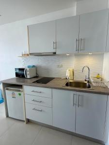 Grand Blue Condominium by Mary
