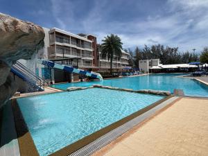 Grand Blue Condominium by Mary