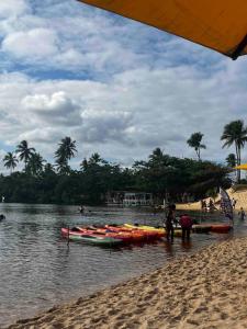 Village beira rio e mar em Imbassaí, Bahia