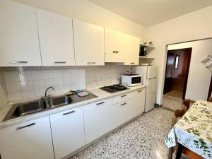 Top-floor flat with parking in Bibione