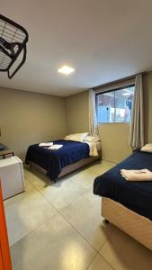Quarto 15 · Suítes aconchegantes em Campos do Jordão, Suíte...